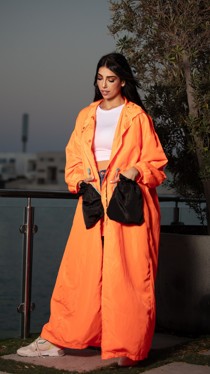 Vibrant Orange Coat with Black Pockets